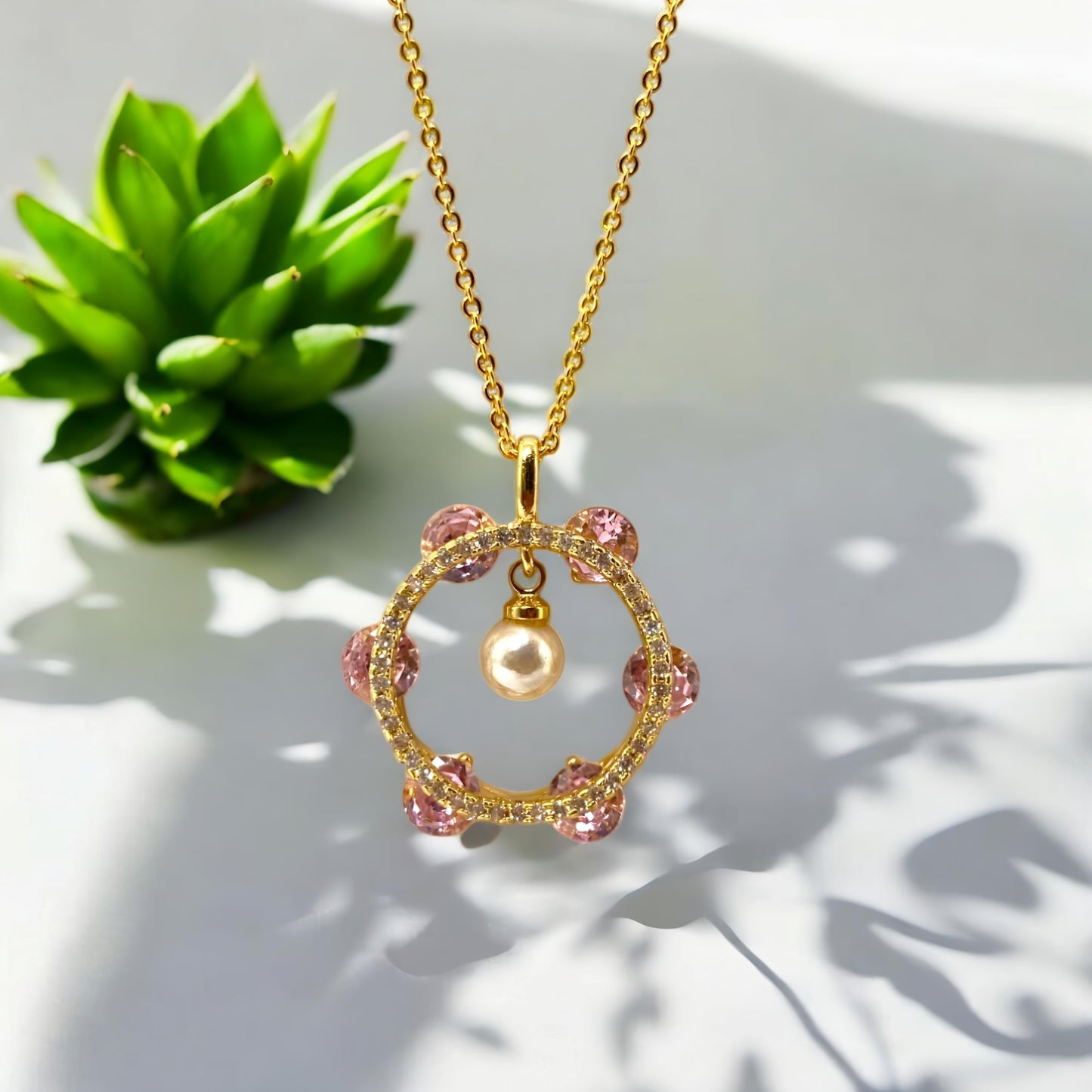Radiant Chain Pendant with Baby Pink Stones and Pearl Drop